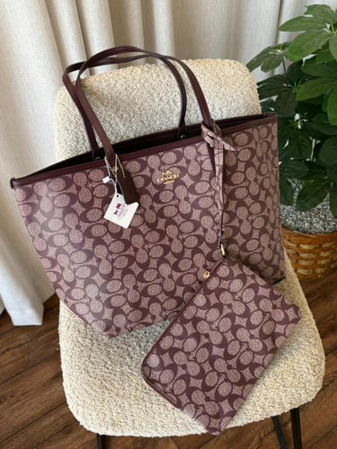 شنطة كوتش دبل فيس