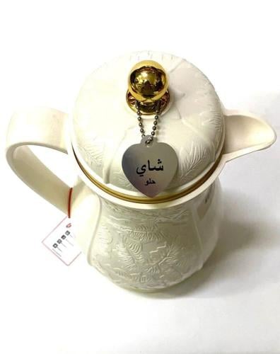 تعليقة شاي حلو معدن