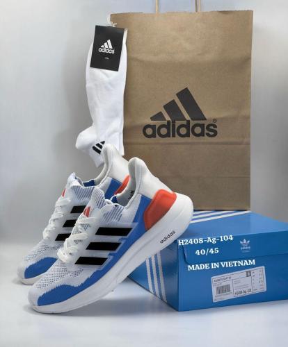 Adidas ازرق مع برتقالي