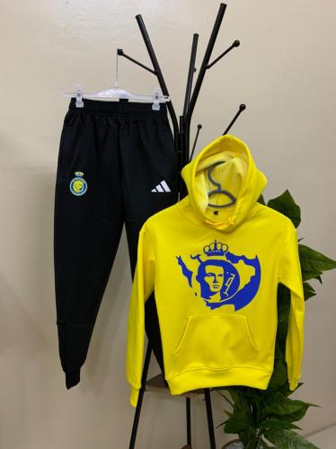 طقم النصر الاصفر