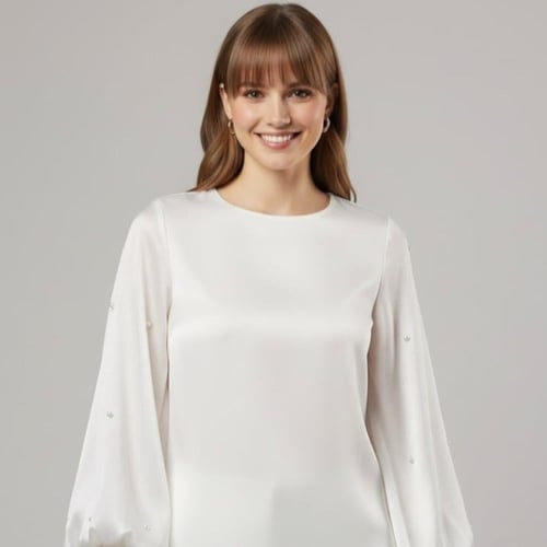 بلوزة وردية بأكمام منفوخة