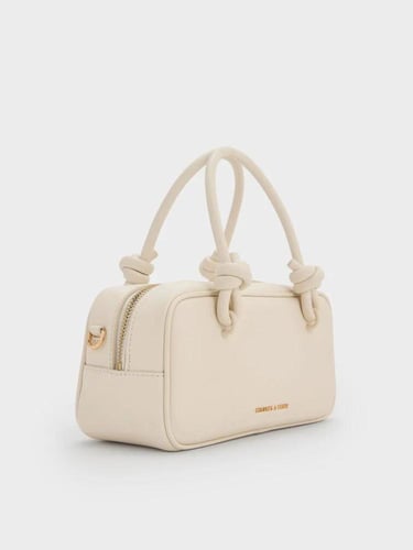 حقيبة يد نسائية بمقبض معقود وتصميم أنيق