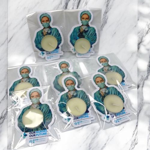 Custom-designed candle and tag favors, 12 pieces