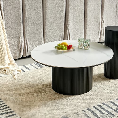 Vienna round coffee table – white marble top and black polygonal base