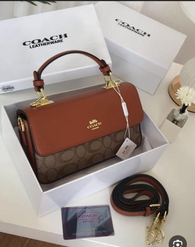 شنطة كوتش ليذر وير