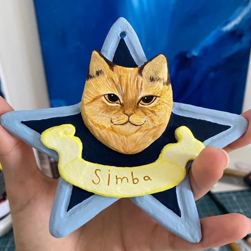 تعليقة سيارة بشكل قطتك