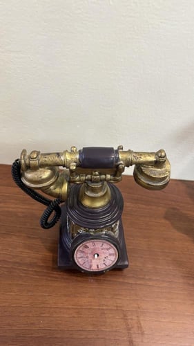 تحفه على شكل هاتف قديم