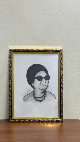 لوحة أم كلثوم بإطار