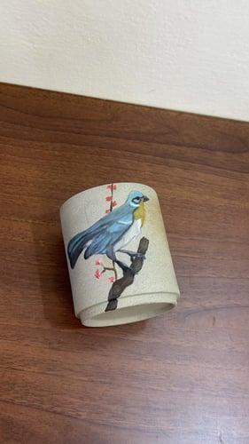 كوب كبير برسمة عصفور