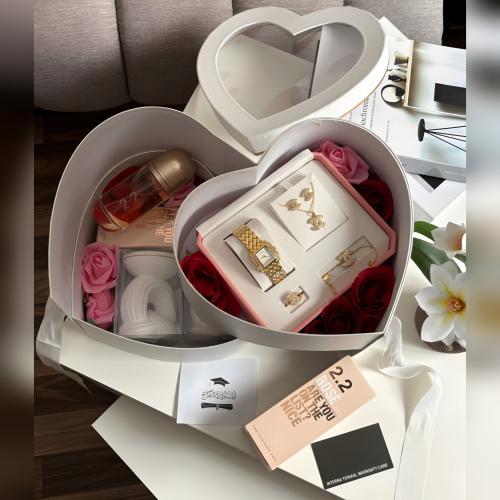 Elegant gift box with distinctive accessories and...