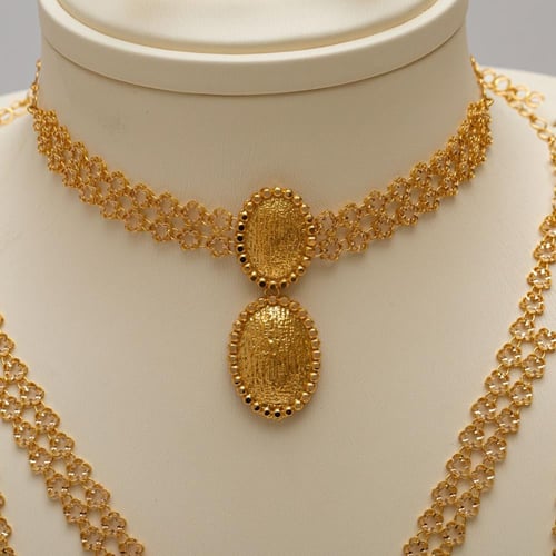 طقم ذهب ملكي عريض 7 قطع عيار 21