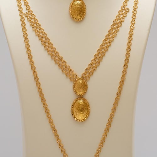 طقم ذهب ملكي عريض 7 قطع عيار 21