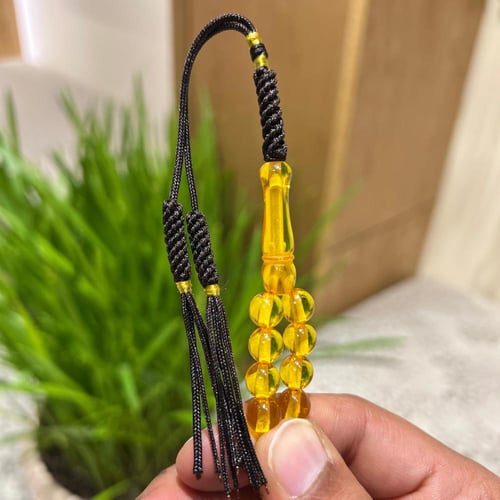 مسباح مستكة أصفر شفاف