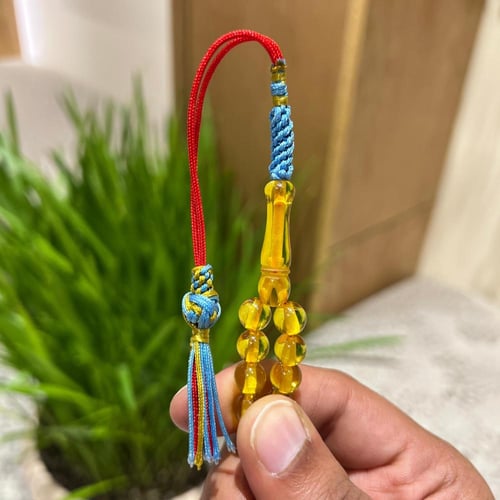 مسباح مستكة أصفر شفاف