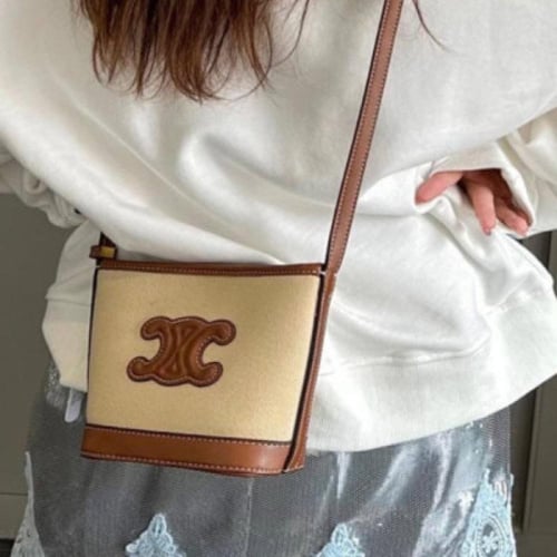 ‎ شنطة نسائية من الجلد بلون بني