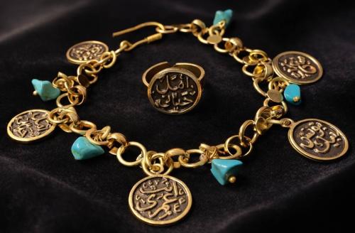 Copper pendant with Arabic inscriptions, turquoise...