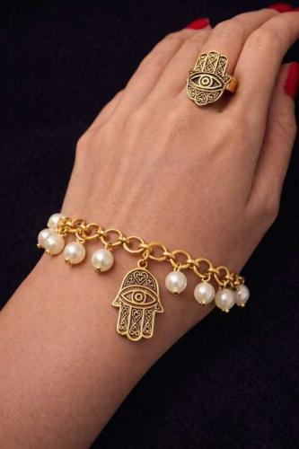 Copper bracelet with white beads