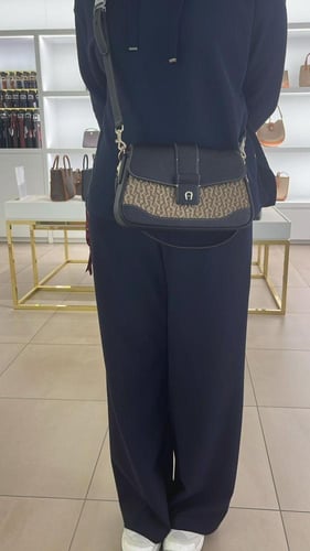 شنطة اقنر اسود وبيج