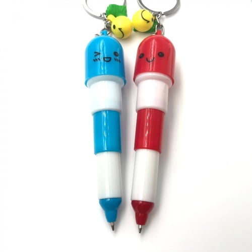 كبسولة ميدالية المفاتيح - قلم