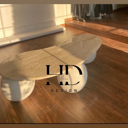 طاوله بسطح رخام قواعد حجر