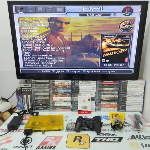 PS2 بلاستيشن تو مبرمج بداخله 125 لعبة لون اصفر شفاف