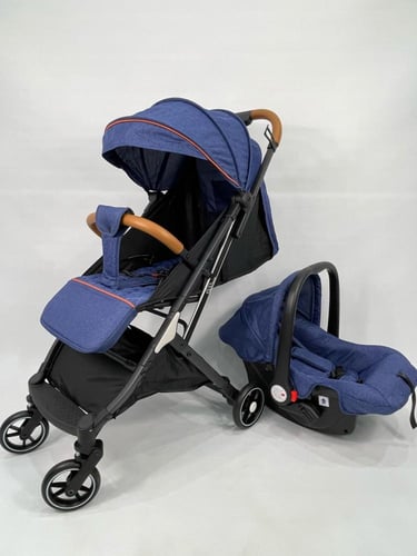 عربة أطفال ماركة(ضحكة) مع كرسي سيارة شيال 2 في 1 ق...