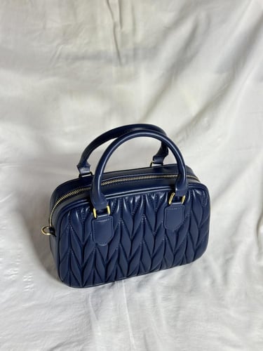 حقيبة ميوميو أزرق -arcade miumiu