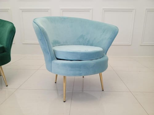 كرسي مخمل قطيفة بأرجل ذهبية