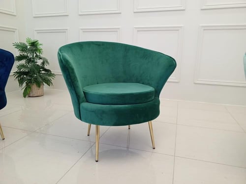 كرسي مخمل قطيفة بأرجل ذهبية