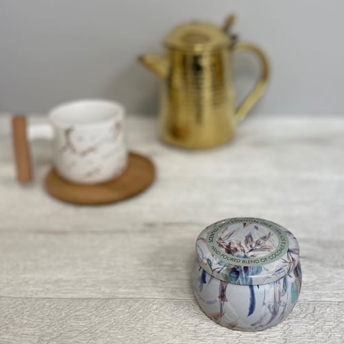 شمع مع رائحة شاي ابيض وبنفسجي