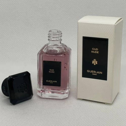 عطر ميني للجنسين عود نود من مجموعة عطور جيرلان الح...