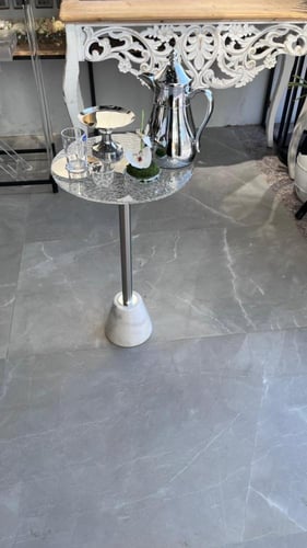 طاولة خدمة اكريلك قاعدة رخام الارتفاع 55سم القطر 3...