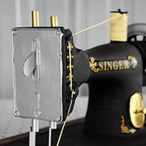 ديكور ماكينة خياطة حديد انتك