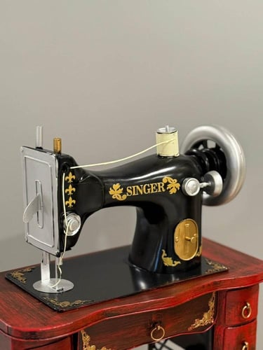 ديكور ماكينة خياطة حديد انتك