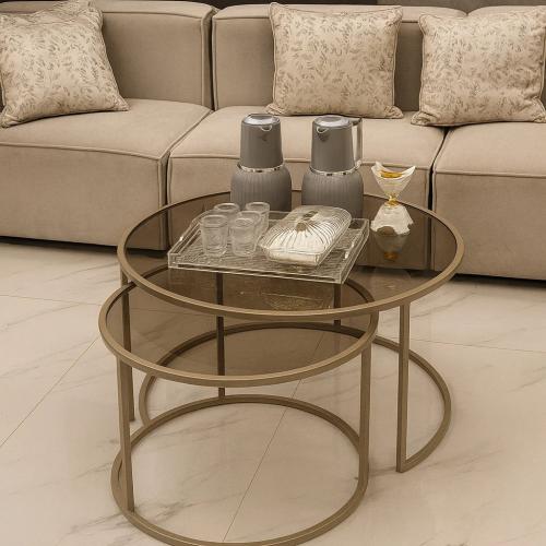 طقم طاولتين شمباني بسطح زجاج بني شفاف أنيق