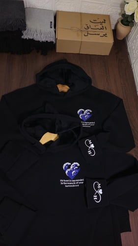 هودي موج البحر مع عبارة