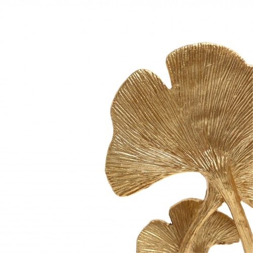 مجسم ذهبي لزهرة اللوتس.