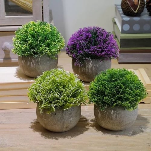 أصيص نبات صناعي.