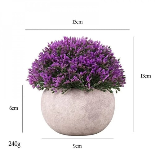 أصيص نبات صناعي.