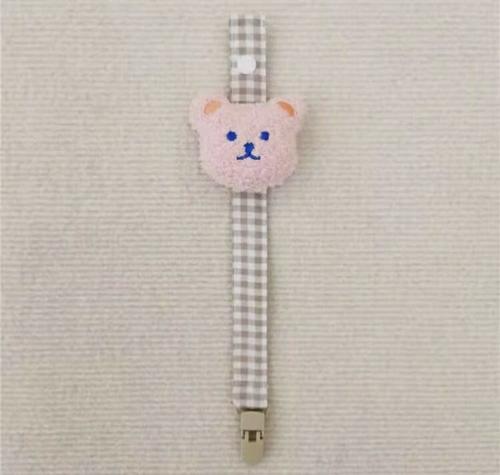 A pendant for hair (pink teddy bear)