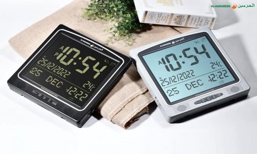 ساعة الحرمين حـائـط و طاولة
