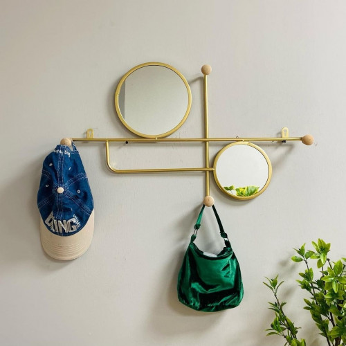 علاقة ملابس حديد ذهبي بمرايا