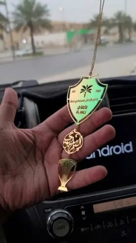 تعليقة الأهلي مع كأس النخبة - الشعار الجديد