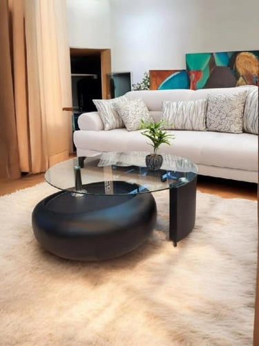 طاوله اساسيه مفرد زجاج شفاف مع خشب أسود بكفرات