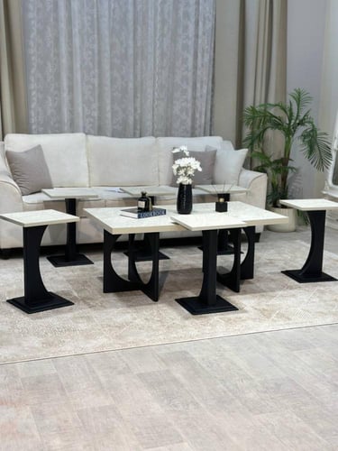 طقم طاولات 7 قطع بديل رخام وقاعدة سوداء مفرغة