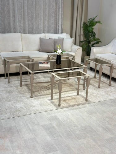 طقم طاولات 5 قطع زجاج بني وهيكل شمباني مودرن