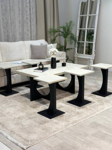 طقم طاولات 7 قطع بديل رخام وقاعدة سوداء مفرغة