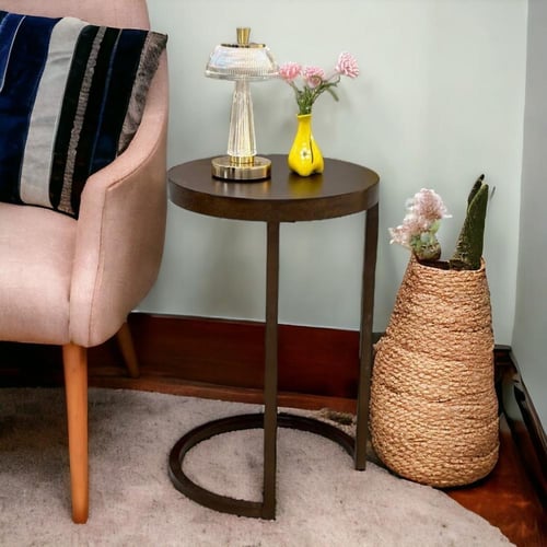 طاولة خدمة عصرية شكل دائري تدخل في الكنب لون أسود