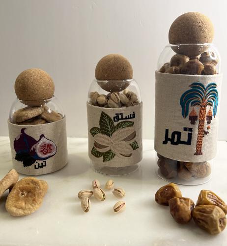 طقم عبوات زجاجية لحفظ التمر والمكسرات المجففة