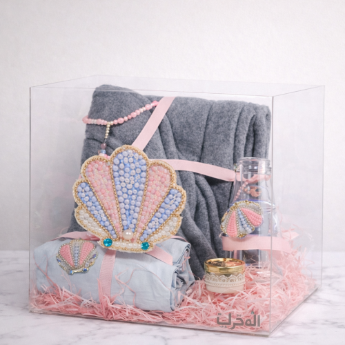 بوكس مكون من شرشف صلاه وسجاده مبطنه وسبحه وزجاجه م...